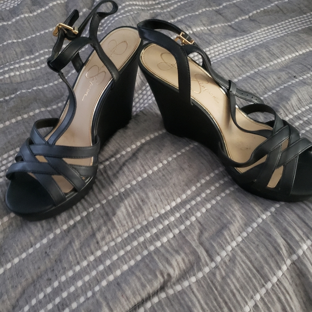 Sleek black wedges